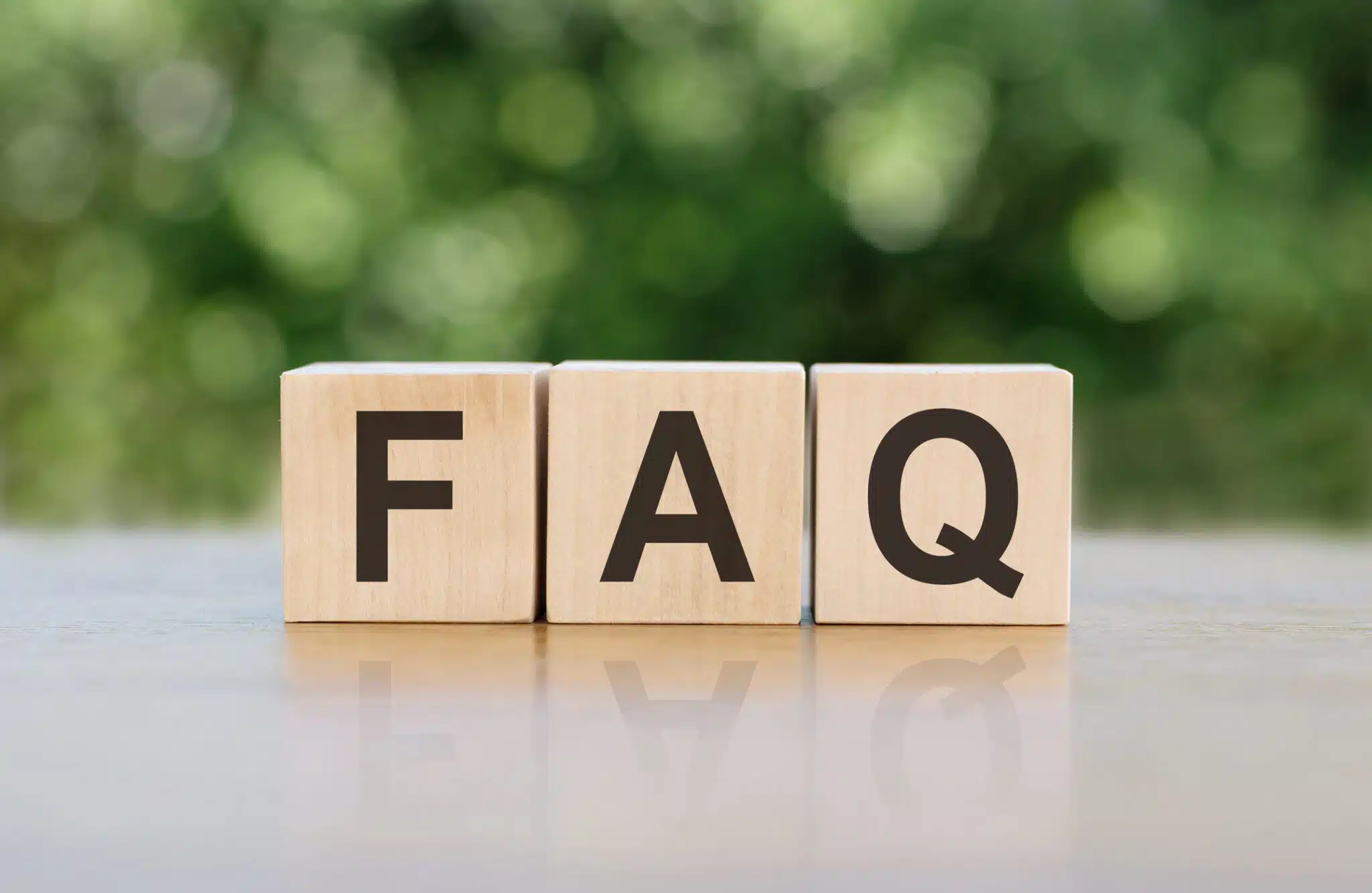 Three block with the lettes FAQ displayed